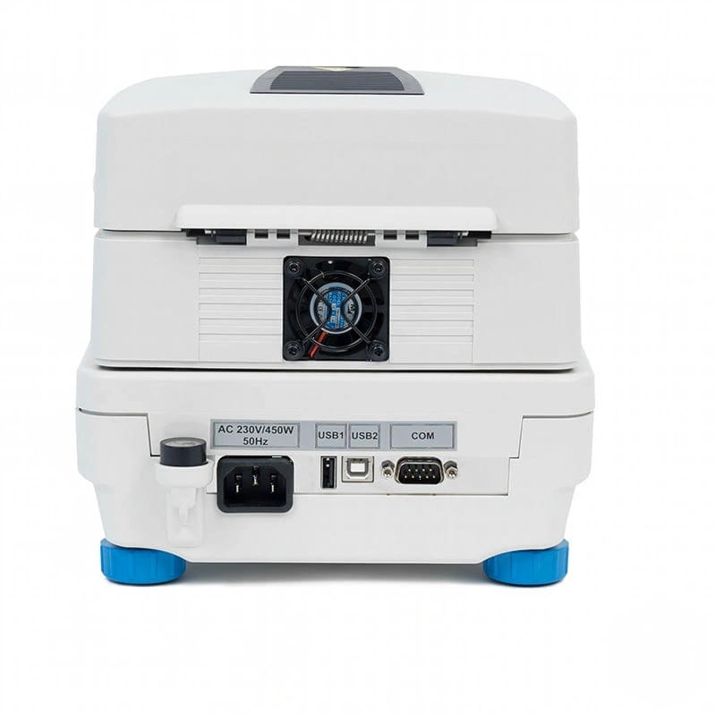 White laboratory-grade fiber optic fusion splicer with blue feet and a black cooling fan, featuring labeled ports including usb1, usb2, com, and an ac power input