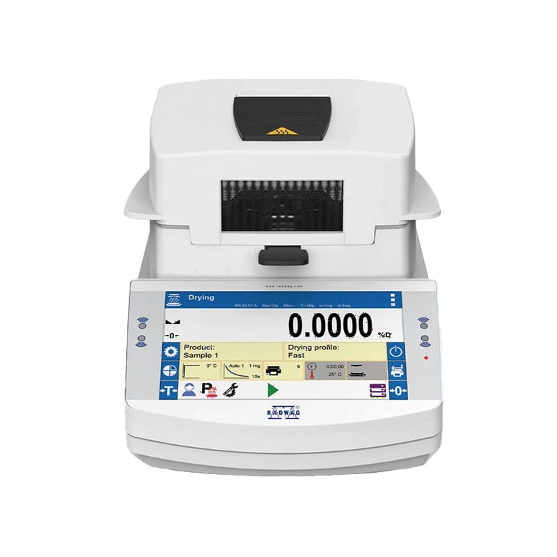 White laboratory-grade moisture analyzer with a digital display showing measurement readings and control buttons