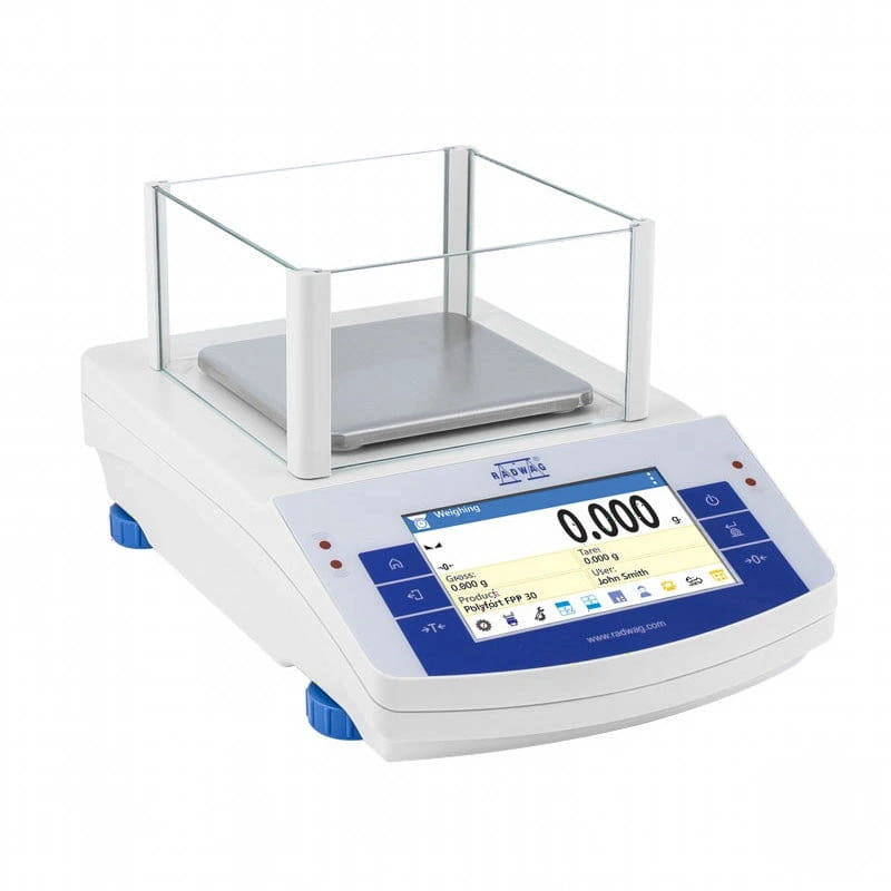 White and blue digital analytical balance with a transparent glass draft shield