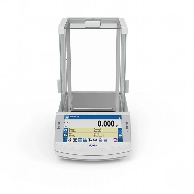 White analytical balance with a digital display showing zero weight, featuring a transparent glass draft shield and metallic weighing pan