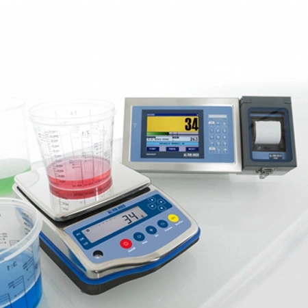 Digital scale with blue and silver casing, displaying a reading of 34 on its screen