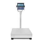 Silver digital platform scale with a rectangular weighing surface and black protective feet
